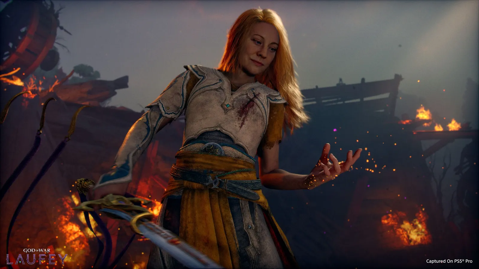 Faye holding the glowing Leviathan Axe while standing in snowy mountainous terrain