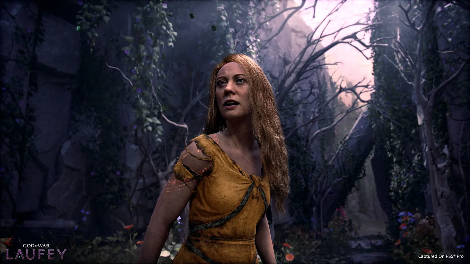 A red-haired woman in a yellow dress looks upward anxiously inside a dark overgrown forest with twisted trees